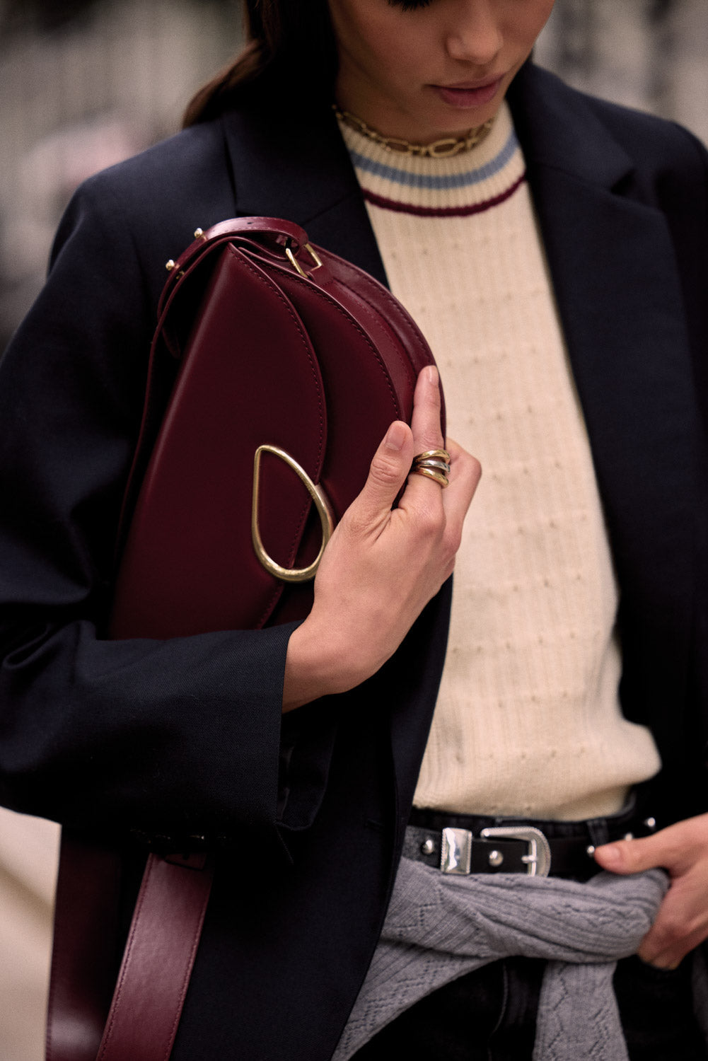 Ecru Pearl sweater with blue and red trim