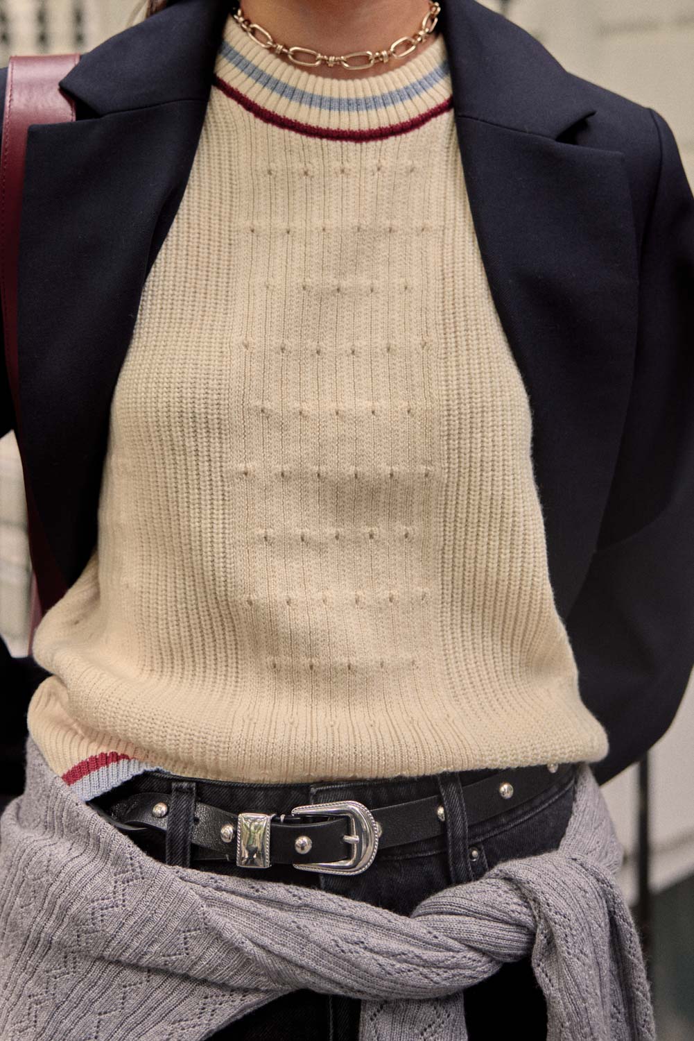 Ecru Pearl sweater with blue and red trim