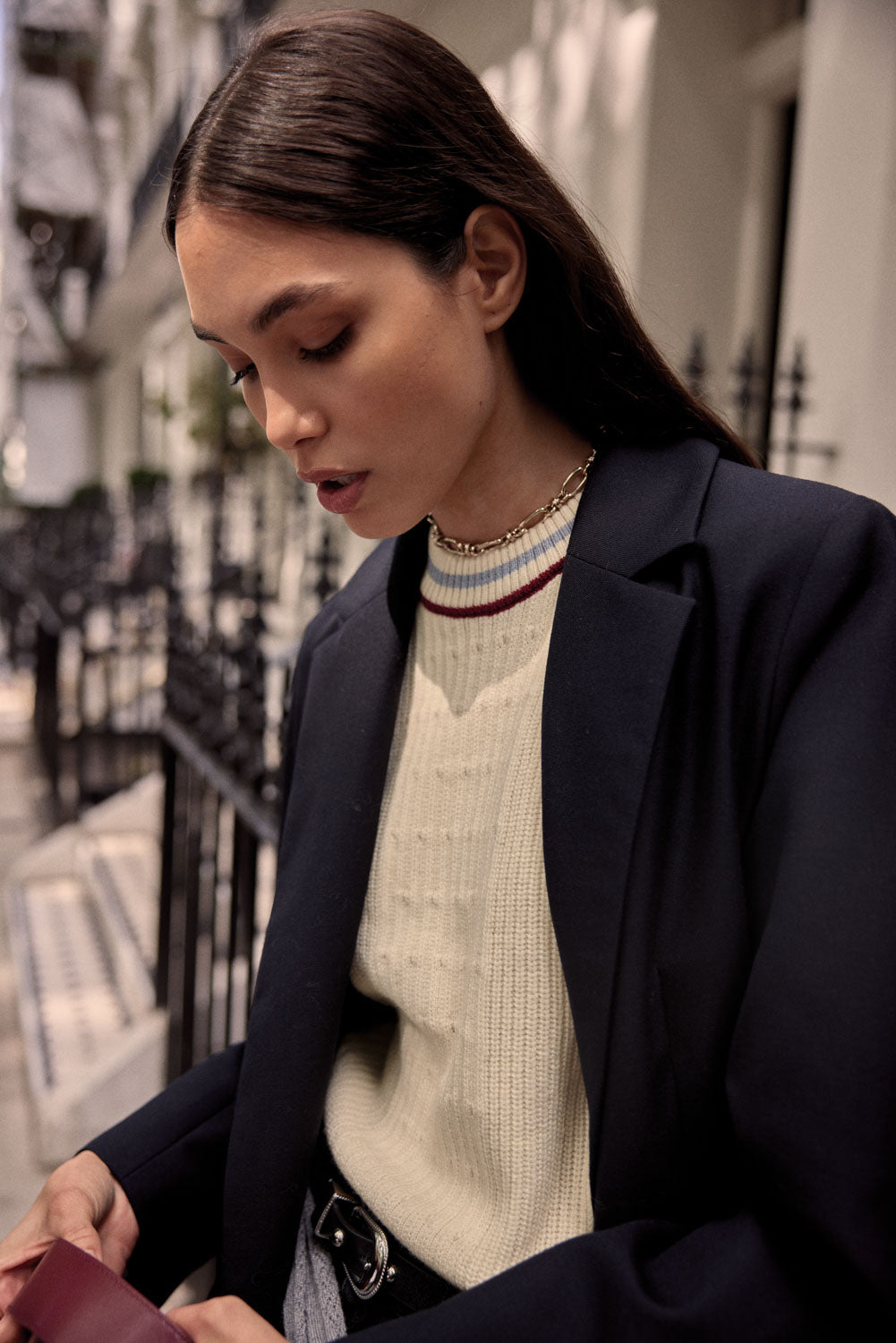 Ecru Pearl sweater with blue and red trim