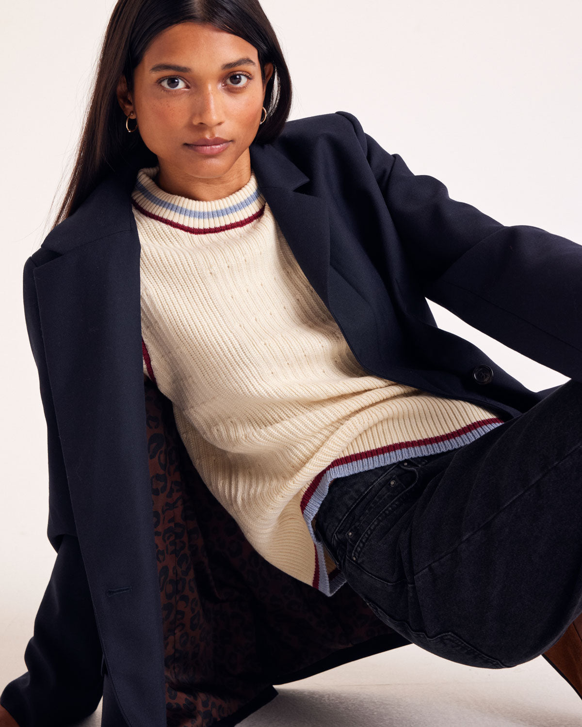 Ecru Pearl sweater with blue and red trim