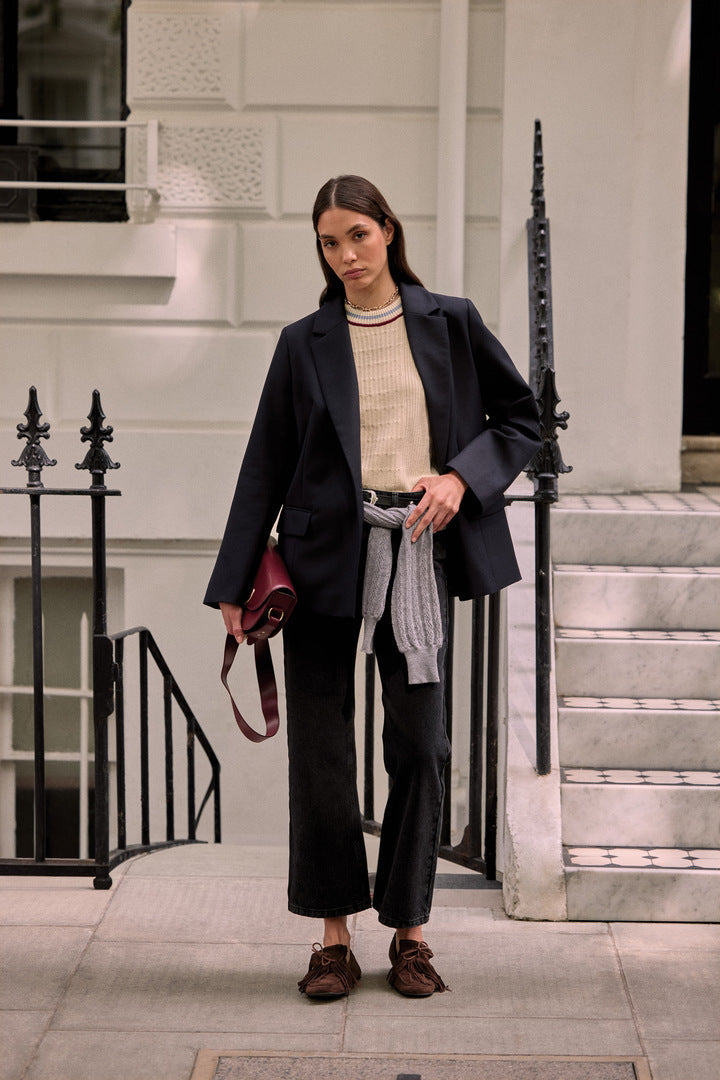 Ecru Pearl sweater with blue and red trim